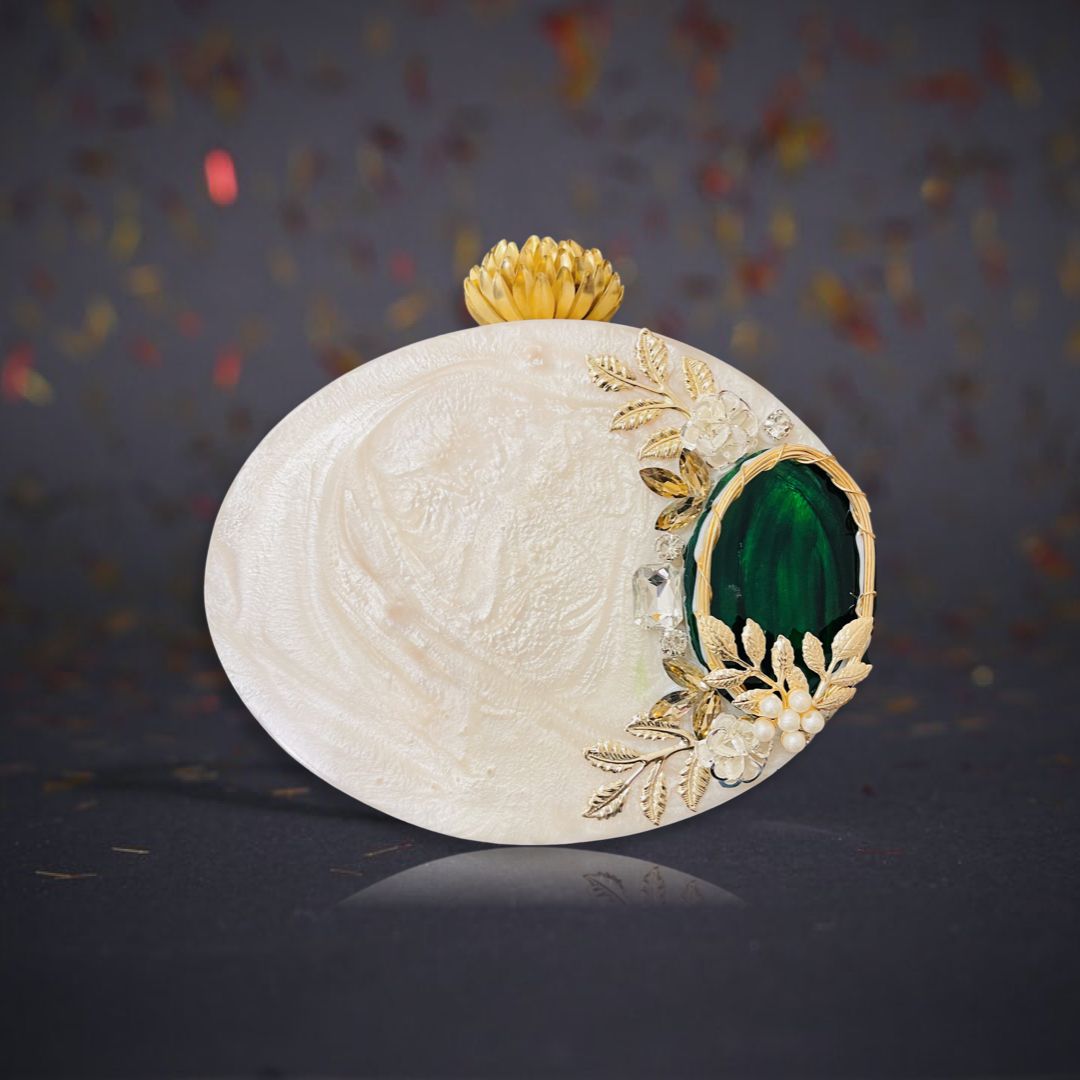 BEAUTIFUL OFF WHITE CLUTCH WITH GREEN STONE WORK